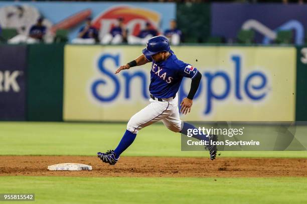 Texas Rangers right fielder Shin-Soo Choo rounds second base during the game between the Texas Rangers and the Detroit Tigers on May 07, 2018 at...