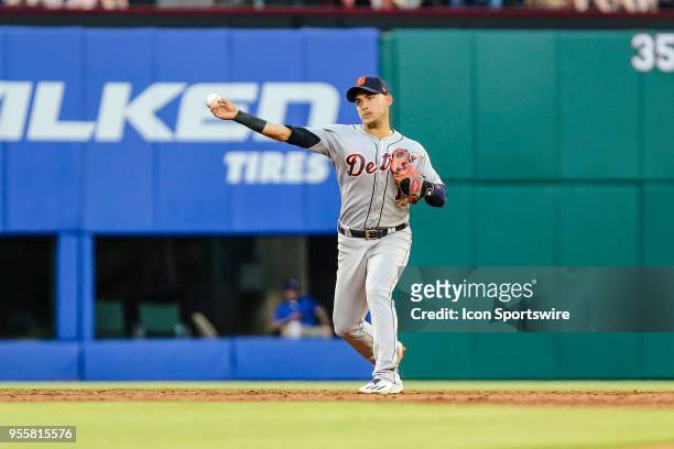 Detroit Tigers shortstop Jose Iglesias throws the ball to first ball during the game between the Texas Rangers and the Detroit Tigers on May 07, 2018...