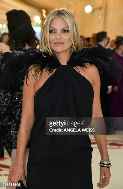 Kate Moss arrives for the 2018 Met Gala on May 7 at the Metropolitan Museum of Art in New York. - The Gala raises money for the Metropolitan Museum...