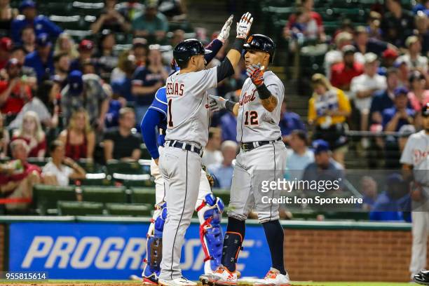 Detroit Tigers center fielder Leonys Martin celebrates a home run with Detroit Tigers shortstop Jose Iglesias during the game between the Texas...