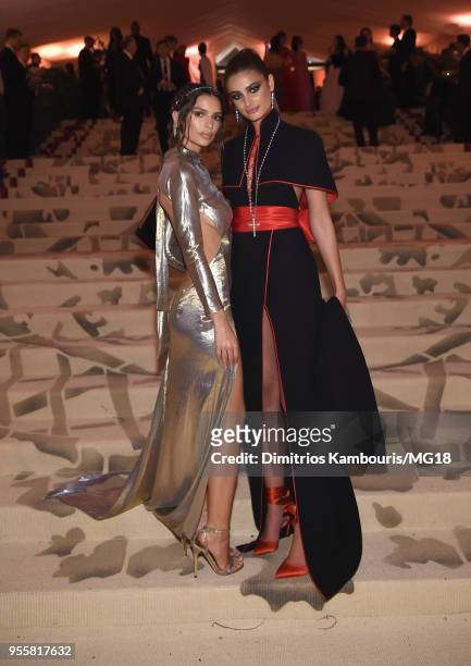 Emily Ratajkowski and Taylor Hill attends the Heavenly Bodies: Fashion & The Catholic Imagination Costume Institute Gala at The Metropolitan Museum...