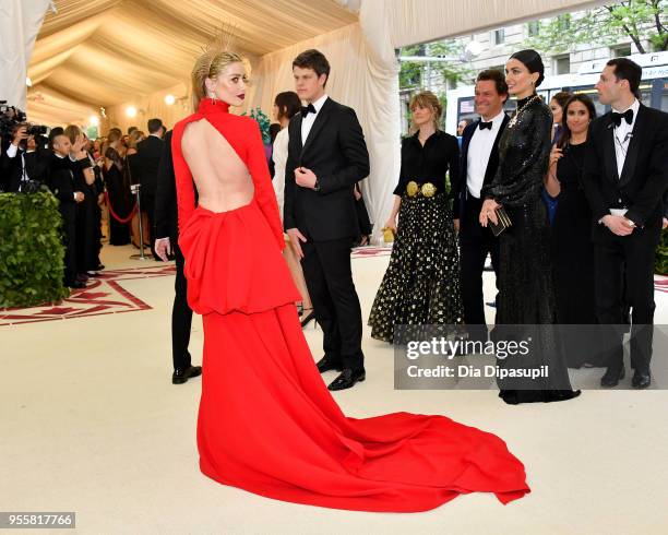 Amber Heard attends the Heavenly Bodies: Fashion & The Catholic Imagination Costume Institute Gala at The Metropolitan Museum of Art on May 7, 2018...