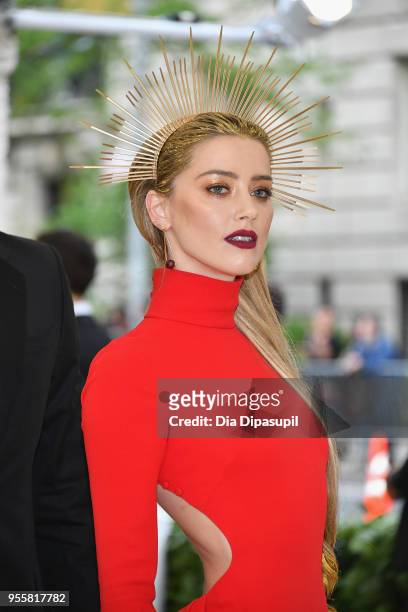 Amber Heard attends the Heavenly Bodies: Fashion & The Catholic Imagination Costume Institute Gala at The Metropolitan Museum of Art on May 7, 2018...
