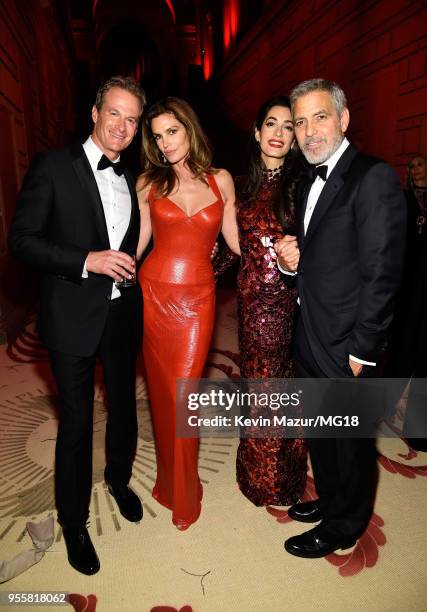 Rande Gerber, Cindy Crawford, Amal Clooney, and George Clooney attend the Heavenly Bodies: Fashion & The Catholic Imagination Costume Institute Gala...