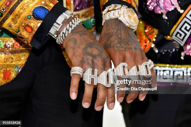 Quavo, fashion detail, attends the Heavenly Bodies: Fashion & The Catholic Imagination Costume Institute Gala at The Metropolitan Museum of Art on...