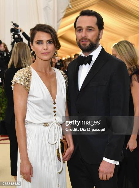 Keri Russell and Matthew Rhys attend the Heavenly Bodies: Fashion & The Catholic Imagination Costume Institute Gala at The Metropolitan Museum of Art...