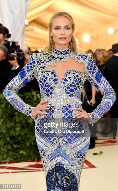 Natasha Poly attends the Heavenly Bodies: Fashion & The Catholic Imagination Costume Institute Gala at The Metropolitan Museum of Art on May 7, 2018...