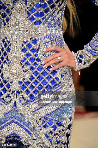 Natasha Poly, fashion detail, attends the Heavenly Bodies: Fashion & The Catholic Imagination Costume Institute Gala at The Metropolitan Museum of...
