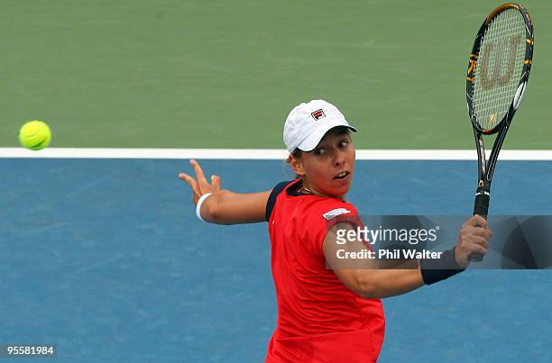 Marina Erakovic of New Zealand plays a backhand in her first round match against Alize Cornet of France during day two of the ASB Classic at the ASB...