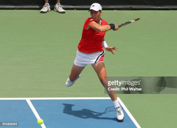 Marina Erakovic of New Zealand plays a forehand in her first round match against Alize Cornet of France during day two of the ASB Classic at the ASB...