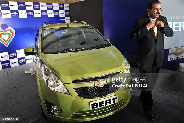 India-auto by Adam Plowright This photo taken on January 4, 2010 shows director and vice-president of General Motors India, P. Balendran, adjusting...