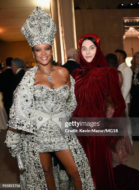 Met Gala Host Rihanna and Susie Bick attend the Heavenly Bodies: Fashion & The Catholic Imagination Costume Institute Gala at The Metropolitan Museum...