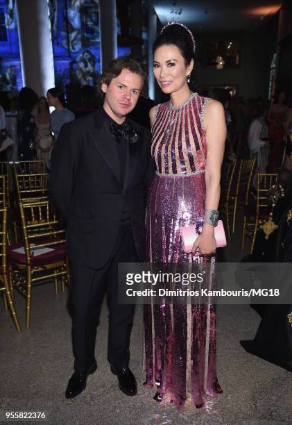 Christopher Kane and Wendi Deng Murdoch attend the Heavenly Bodies: Fashion & The Catholic Imagination Costume Institute Gala at The Metropolitan...