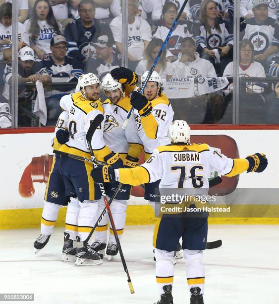 Roman Josi, Viktor Arvidsson, P.K. Subban and Ryan Johansen of the Nashville Predators congratulate teammate Filip Forsberg on his second goal...