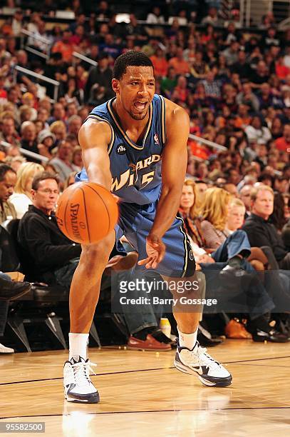Dominic McGuire of the Washington Wizards moves the ball against the Phoenix Suns during the game on December 19, 2009 at U.S. Airways Center in...