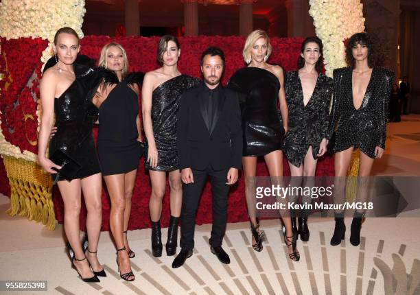 Amber Valletta, Kate Moss, Charlotte Casiraghi, Anthony Vaccarello, Anja Rubik, Charlotte Gainsbourg and Mica Arganaraz attend the Heavenly Bodies:...