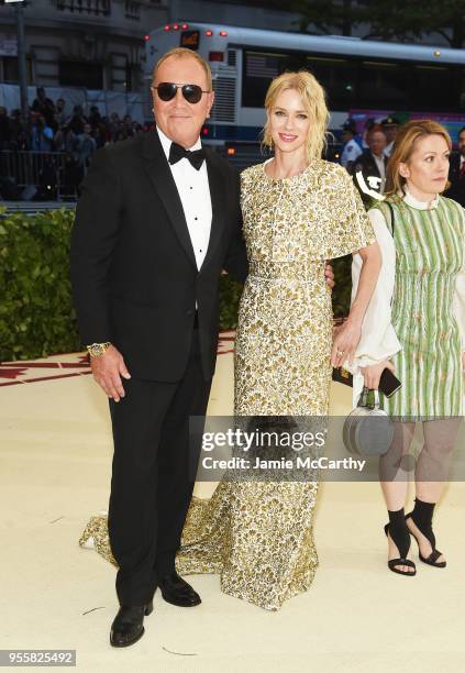 Michael Kors and Naomi Watts attend the Heavenly Bodies: Fashion & The Catholic Imagination Costume Institute Gala at The Metropolitan Museum of Art...