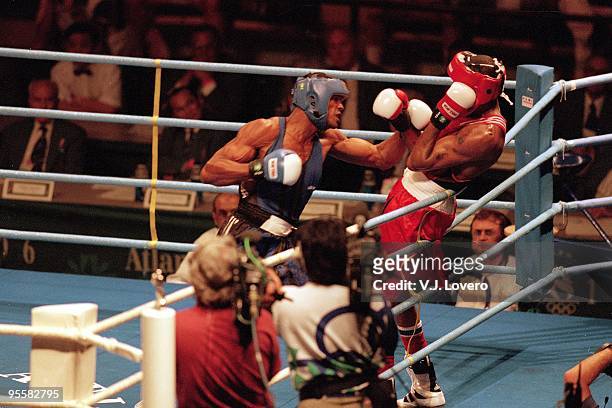 Summer Olympics: Cuba Felix Savon in action vs Canada David Defiagbon during Heavyweight Gold Medal Match at Alexander Memorial Coliseum. Atlanta, GA...