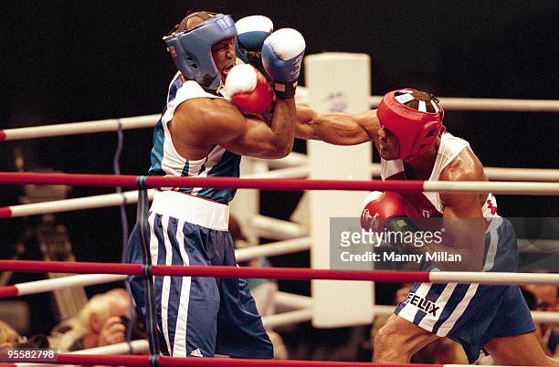 Summer Olympics: Cuba Felix Savon in action vs USA Michael Bennett during Men's Heavyweight Quarterfinals at Sydney Convention and Exhibition Centre....