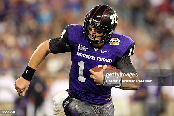 Quarterback Andy Dalton of the TCU Horned Frogs runs the ball in the second half against the Boise State Broncos during the Tostitos Fiesta Bowl at...