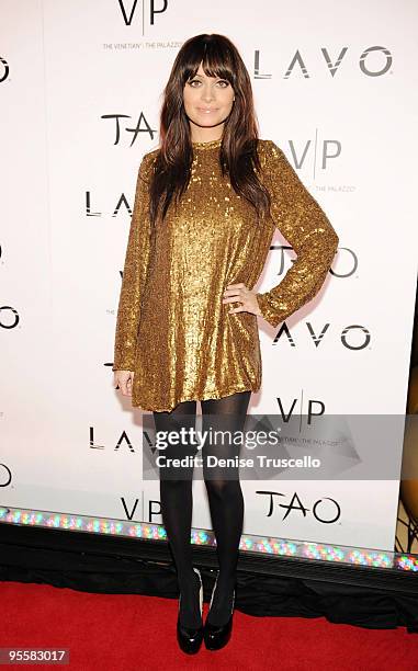 Nicole Richie poses for photos on the TAO/Lavo red carpet at the Venetian on December 31, 2009 in Las Vegas, Nevada.
