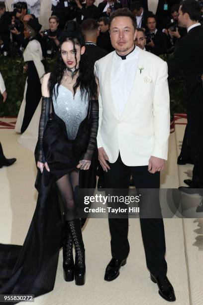 Grimes and Elon Musk attend "Heavenly Bodies: Fashion & the Catholic Imagination", the 2018 Costume Institute Benefit at Metropolitan Museum of Art...