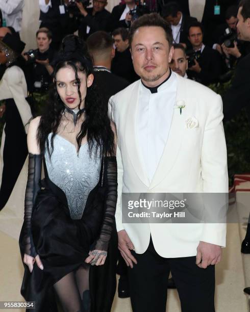 Grimes and Elon Musk attend "Heavenly Bodies: Fashion & the Catholic Imagination", the 2018 Costume Institute Benefit at Metropolitan Museum of Art...