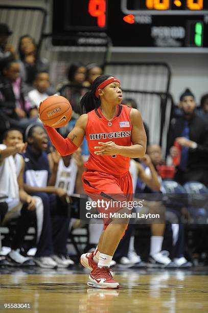 Khadijah Rushdan of the Rutgers Scarlet Knights looks to make a pass during a women's college basketball game against the George Washington Colonials...