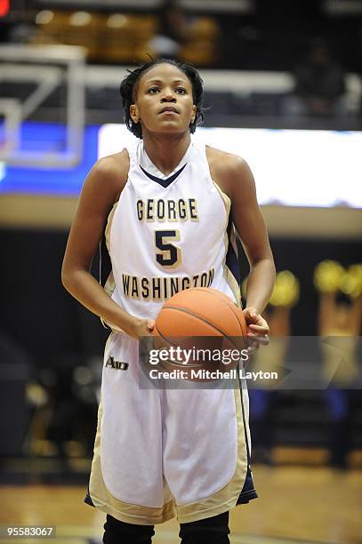 Tiana Myers of the George Washington Colonials takes a foul shot during a women's college basketball game against the Rutgers Scarlet Knight on...