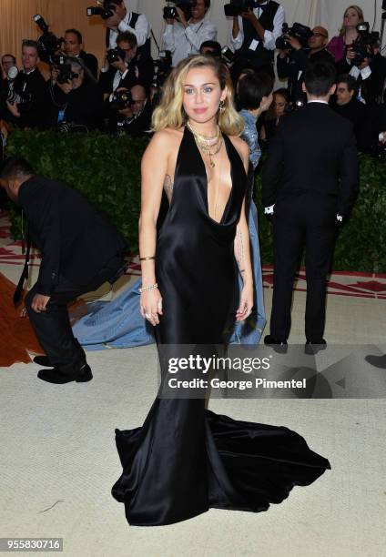 Miley Cyrus attends the Heavenly Bodies: Fashion & The Catholic Imagination Costume Institute Gala at Metropolitan Museum of Art on May 7, 2018 in...
