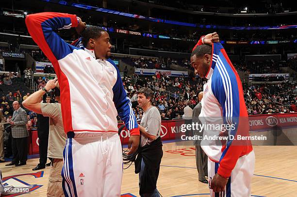 DeAndre Jordan and Rasual Butler of the Los Angeles Clippers perform pre-game antics before taking on the Portland Trail Blazers at Staples Center on...