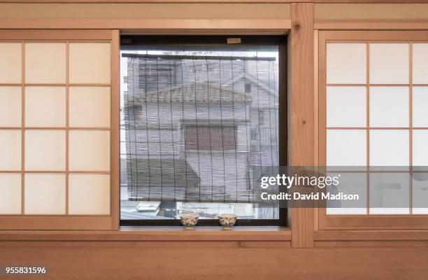 view through window, kyoto, japan - porta di carta giapponese foto e immagini stock