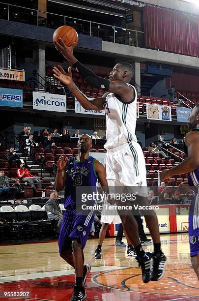 Marcus Hubbard of the Reno Bighorns goes to the basket against Connor Atchley of the Dakota Wizards during the 2010 D-League Showcase at Qwest Arena...