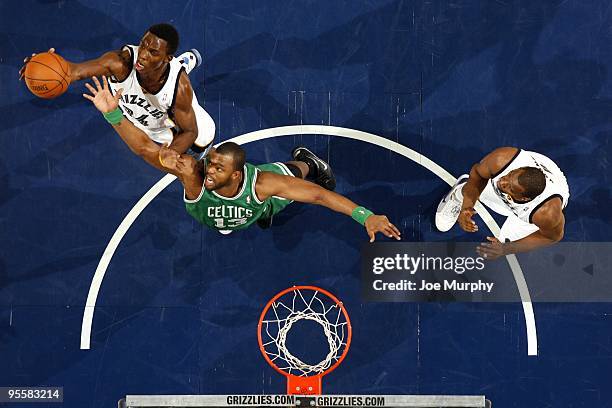 Hasheem Thabeet of the Memphis Grizzlies rebounds against Shelden Williams of the Boston Celtics during the game at the FedExForum on December 14,...