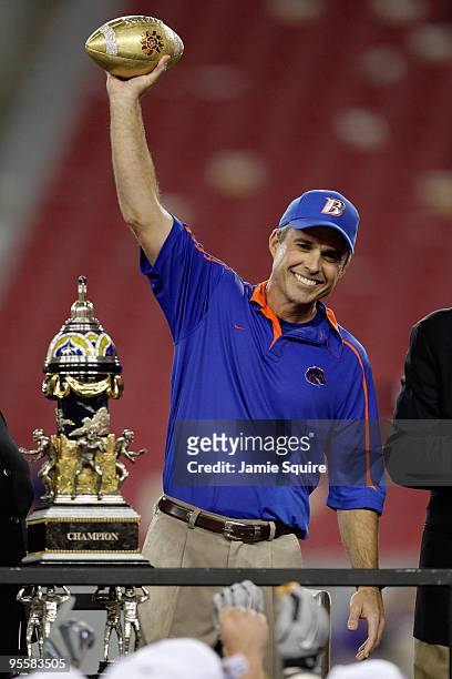 Head coach Chris Petersen of the Boise State Broncos celebrates after defeating the TCU Horned Frogs 17-10 during the Tostitos Fiesta Bowl at the...
