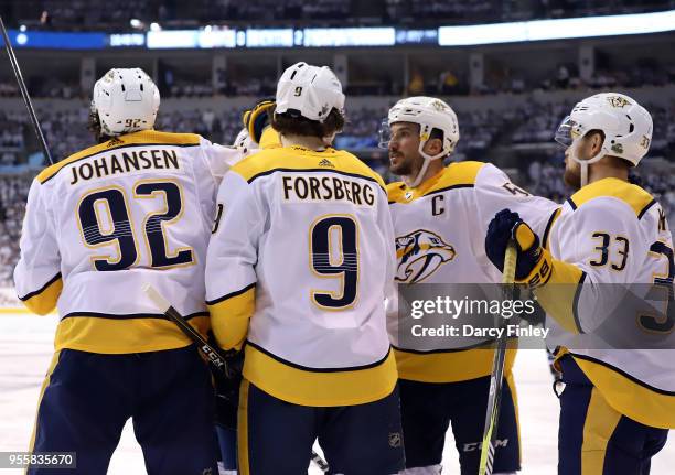 Ryan Johansen, Filip Forsberg, P.K. Subban, Roman Josi and Viktor Arvidsson of the Nashville Predators celebrate a third period goal against the...