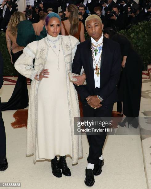 Pharrell Williams and Helen Lasichanh attend "Heavenly Bodies: Fashion & the Catholic Imagination", the 2018 Costume Institute Benefit at...