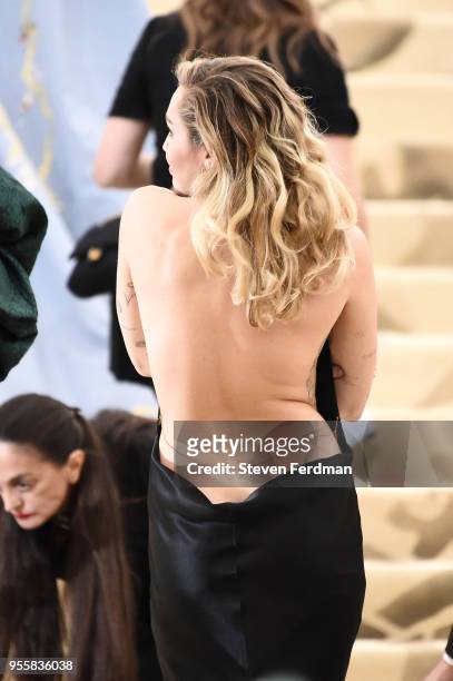 Miley Cyrus attends Heavenly Bodies: Fashion & The Catholic Imagination Costume Institute Gala at Metropolitan Museum of Art on May 7, 2018 in New...
