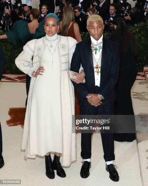 Pharrell Williams and Helen Lasichanh attend "Heavenly Bodies: Fashion & the Catholic Imagination", the 2018 Costume Institute Benefit at...