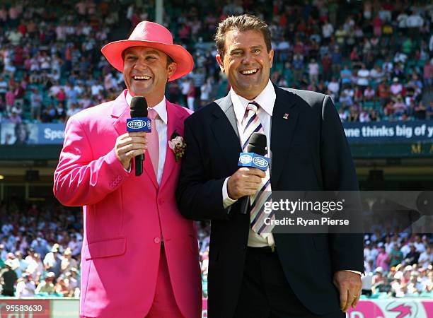 Television commentator and former Australian cricketer Michael Slater wears a pink suit in support of the McGrath Foundation as he poses with...