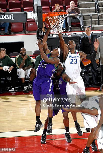 Maurice Baker of the Dakota Wizards goes to the basket against Marcus Hubbard of the Reno Bighorns during the 2010 D-League Showcase at Qwest Arena...