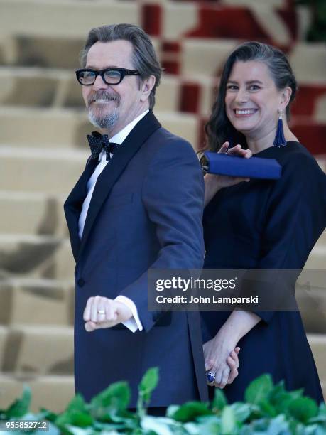 Gary Oldman and Gisele Schmidt attend Heavenly Bodies: Fashion & The Catholic Imagination Costume Institute Gala at The Metropolitan Museum of Art on...