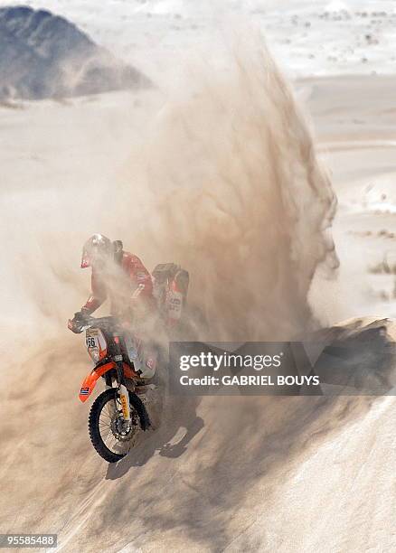 Kutiu Torunlar of Turkey rides his KTM during the 3rd stage of the Dakar 2010 between La Rioja and Fiambala, Argentina, on January 4, 2010. France's...