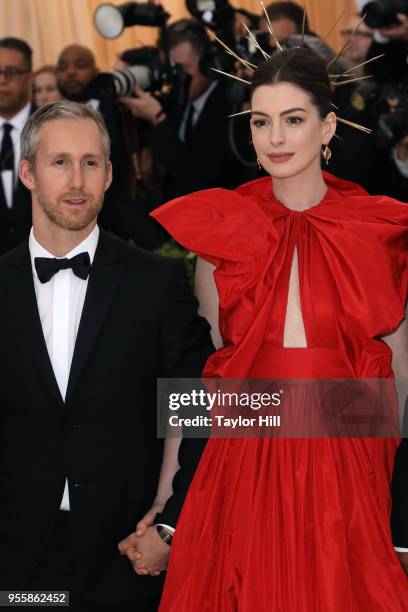 Adam Shulman and Anne Hathaway attend "Heavenly Bodies: Fashion & the Catholic Imagination", the 2018 Costume Institute Benefit at Metropolitan...