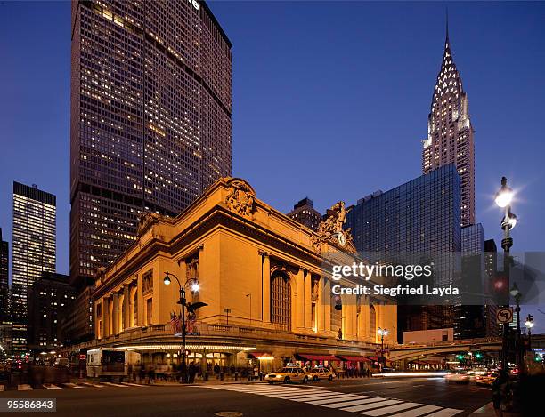 new york grand central station at dusk - the chrysler building and grand central station stock pictures, royalty-free photos & images