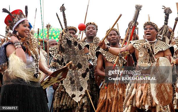 South African President Jacob Zuma , wearing leopard skins, sings and dances with his newly wed Thobeka Madiba at their wedding ceremony on 04...