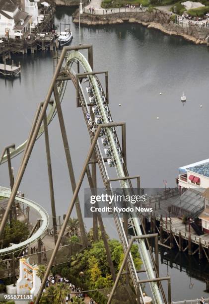 Photo taken from a Kyodo News helicopter on May 1 shows the Flying Dinosaur roller coaster at Universal Studios Japan in Osaka, western Japan, after...