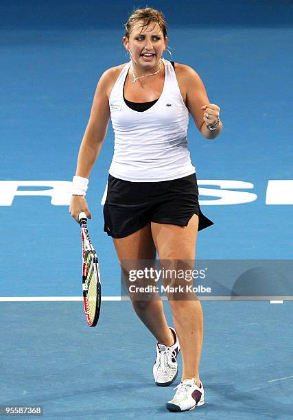 Timea Bacsinszky of Switzerland celebrates winning a point in her second round match against Ana Ivanovic of Serbia during day three of the Brisbane...