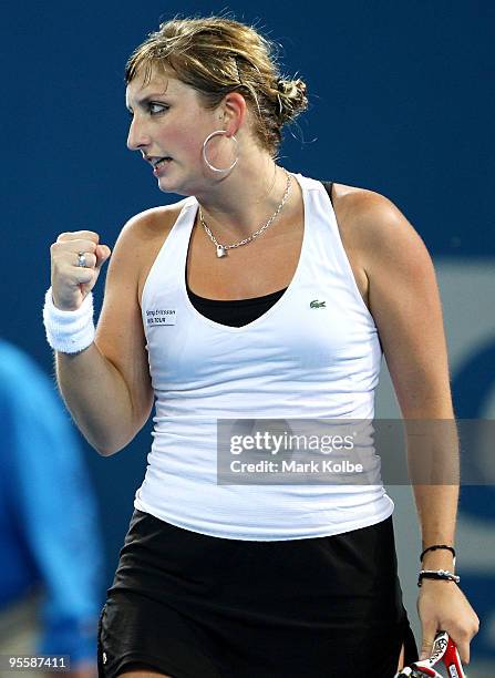 Timea Bacsinszky of Switzerland celebrates winning a point in her second round match against Ana Ivanovic of Serbia during day three of the Brisbane...