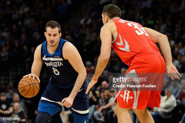Nemanja Bjelica of the Minnesota Timberwolves dribbles the ball against Ryan Anderson of the Houston Rockets in Game Four of Round One of the 2018...
